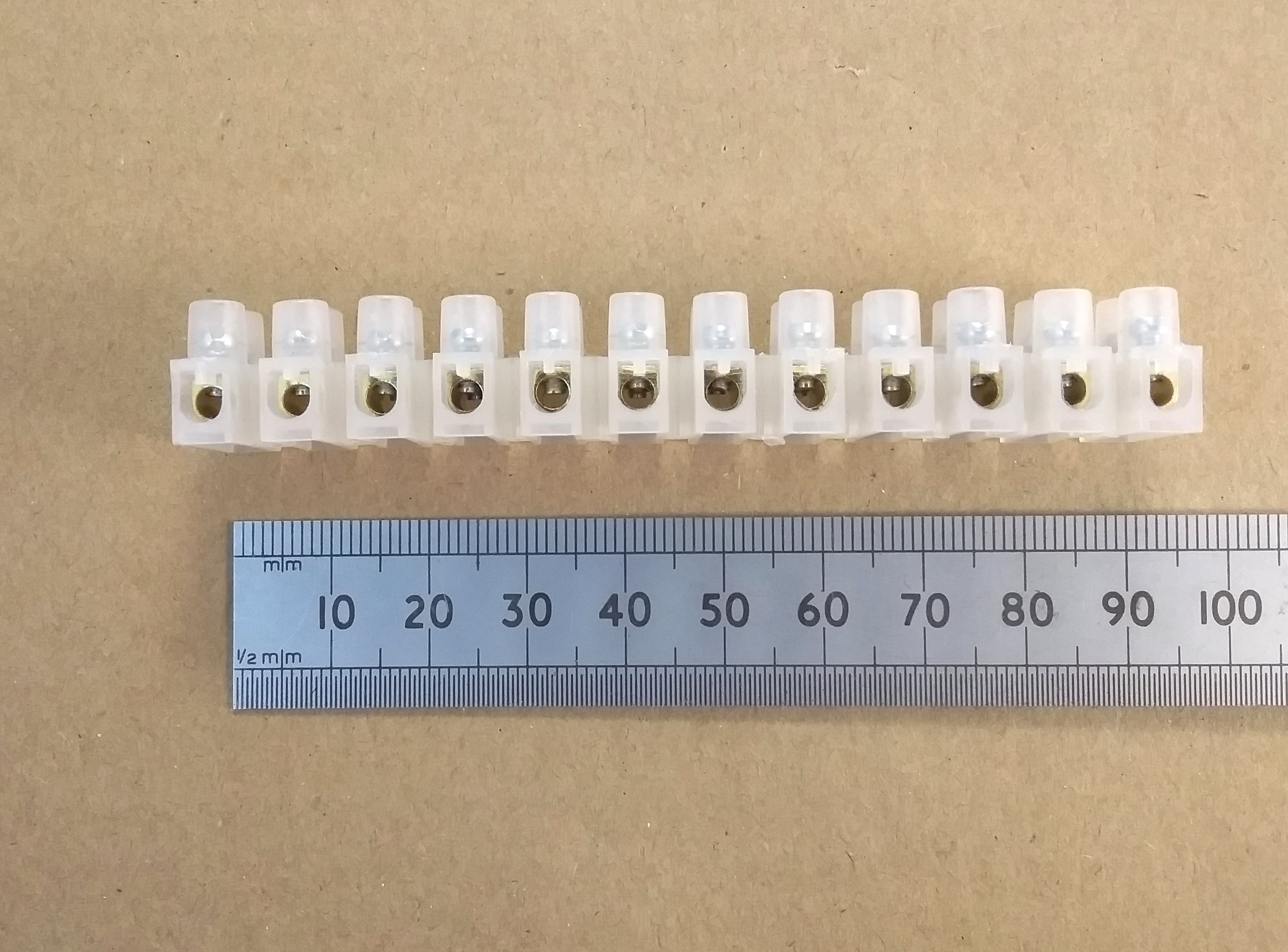 click to enlarge 3 Amp Terminal Strip or
"Choccy Block" Side View Into The Holes