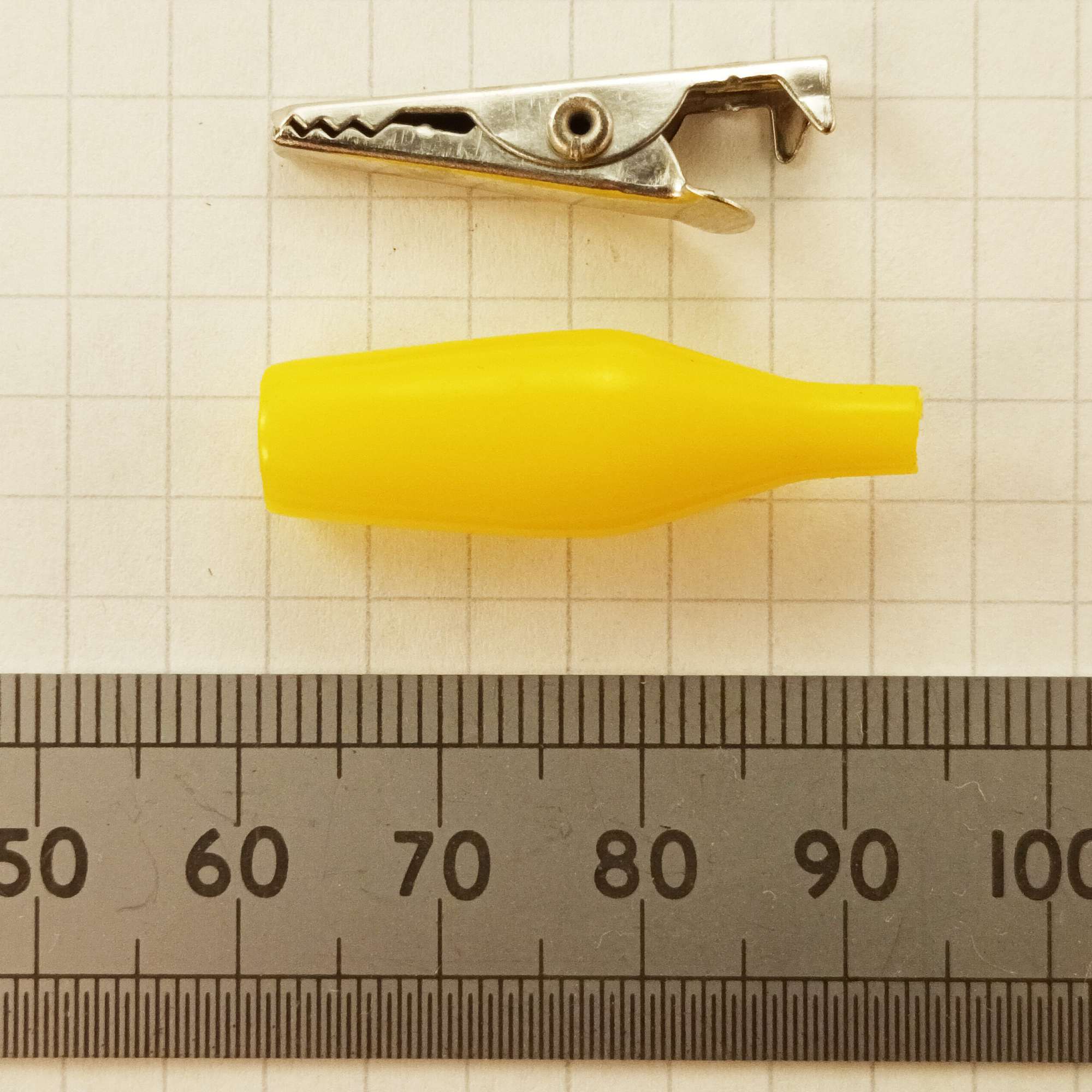 Yellow miniature insulated
              crocodile clip as used in the HJW Electronics crystal set
              radio kit